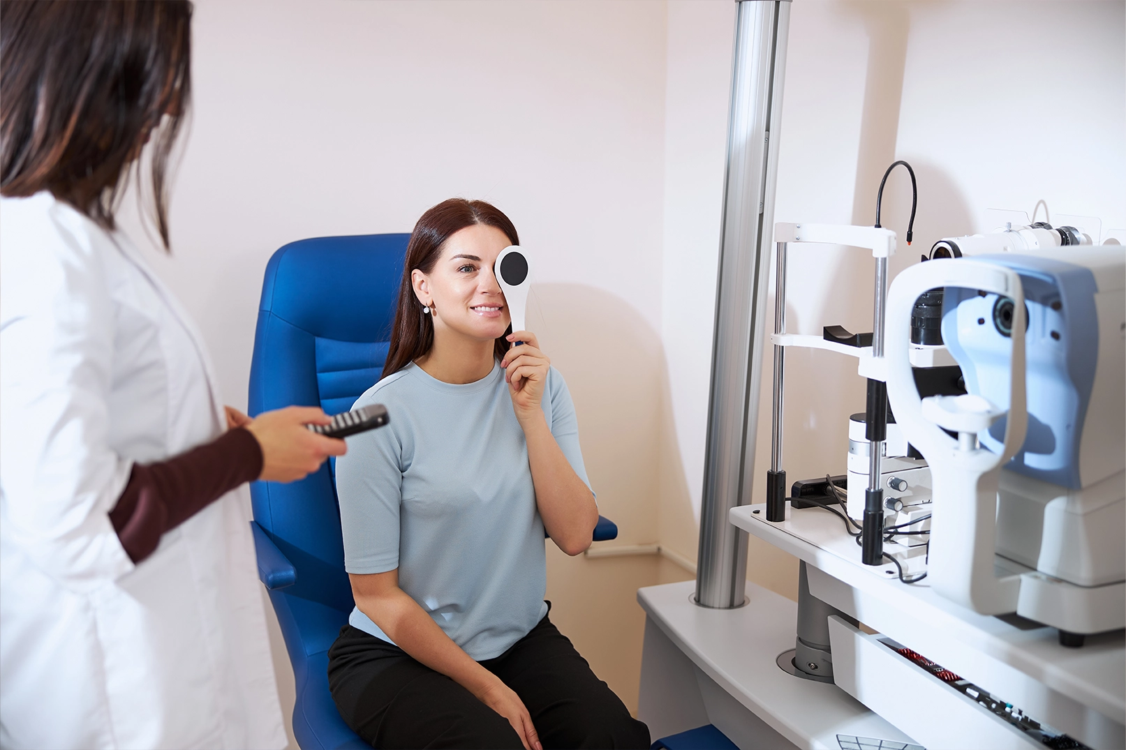 A woman getting an assessment at an eye clinic